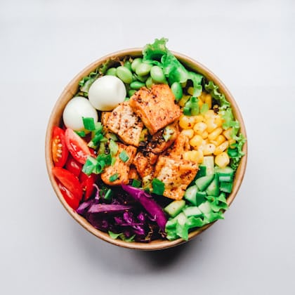 Herb-crusted fish with green vegetables